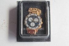 Pin's publicitaire Montre