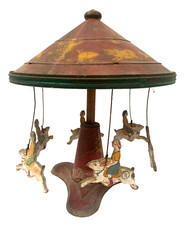 Jouet ancien en tôle peinte "Le manège aux lapins " XX siècle