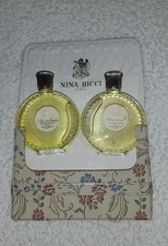 Coffret duo Nina Ricci, flacons montres "L'air du temps" et "Capricci" pleins.