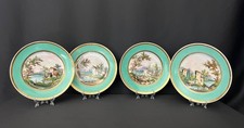 Suite de quatre assiettes en