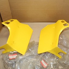 2 CACHES RADIATEUR NEUF RM 125