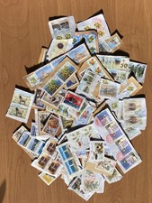 ALGERIE +/- 135 à 140 timbres oblitérés sur fragments