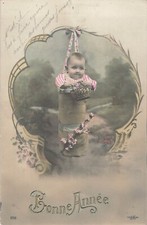 CP BONNE ANNEE BEBE SUSPENDU