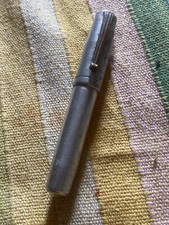 Ancien briquet stylo en aluminium Pub