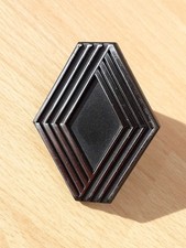 Logo chromé de calandre