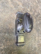 Ancienne crémone de fenetre en fonte.