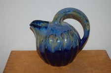 Ancien pichet , vase , coulure