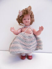 PETITE  POUPÉE MÉCANIQUE GÉGÉ EN CELLULOÏD - Hauteur16 cm - manque la clef