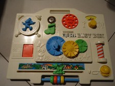 ancien tableau d'eveil / boite a musique DISNEY "musical busy box" 1977