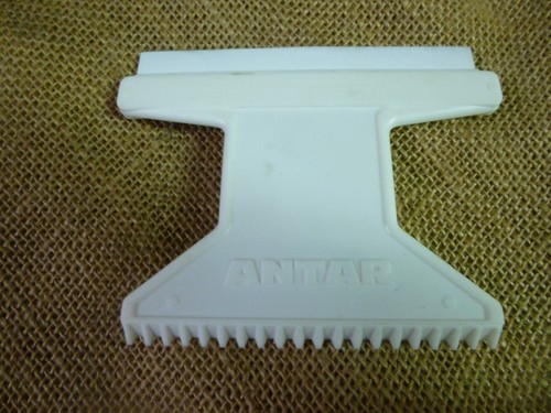 Ancienne raclette gratte givre