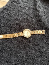 Montre femme Fossil en métal doré