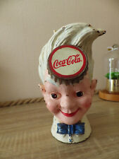 TIRELIRE ANCIENNE COCA COLA SPRITE BOY EN FONTE