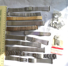 Lot d'anciens bracelets de montre en métal