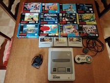 console super nintendo +12 jeux avec leur boite et 3 sans boite