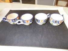 4 petites tasses à liqueur en