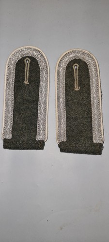 Paire patte épaule - de, d'épaule