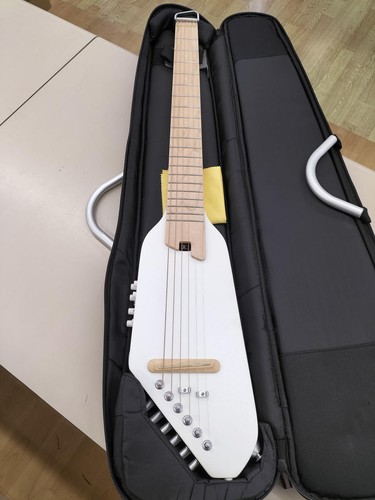 Guitare voyage donner - de,