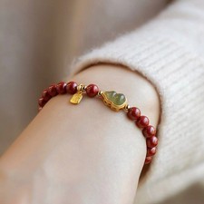 Bague cinabre unique avec jade