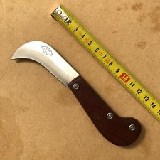 222 garanti. Couteau pliant