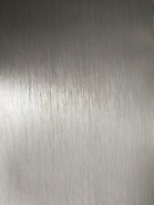 Papier adhesif inox brossé l 15 cm L 300 cm. Etat neuf.