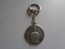 PORTE CLE METAL COGNAC COURVOISIER THE BRANDY OF NAPOLEON