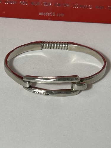 Unode50 tied sculptural bangle - sculptural,