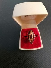 Bague marquise or jaune  18K sertie grenats,  poinçonnée,  T 54