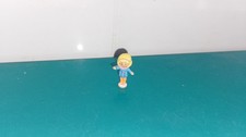 Polly pocket figurine doll