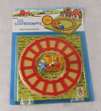 Ancien train mécanique Wind Up, Schtroumpfs, Ceji / Peyo, sous blister, 1983