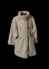 Manteau fausse fourrure