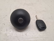 Bouchon réservoir avec une