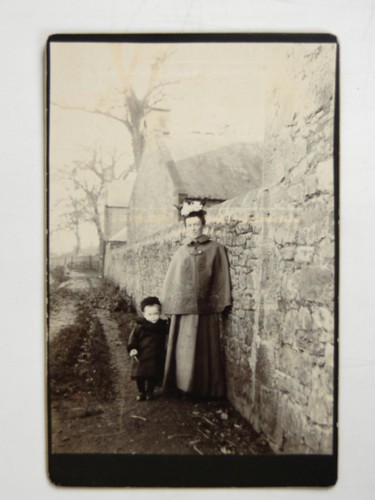 Woman child stone wall country - woman,