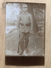 carte postale allemande soldat avec couvre casque octobre 1917