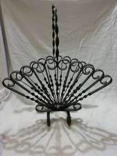 Grand porte revue en fer forgé .  H. 58cm . XXéme