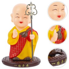 Ornement de moine à tête de