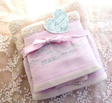 2 serviettes de toilette style