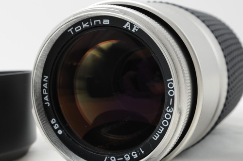 Near mint tokina af - [near,
