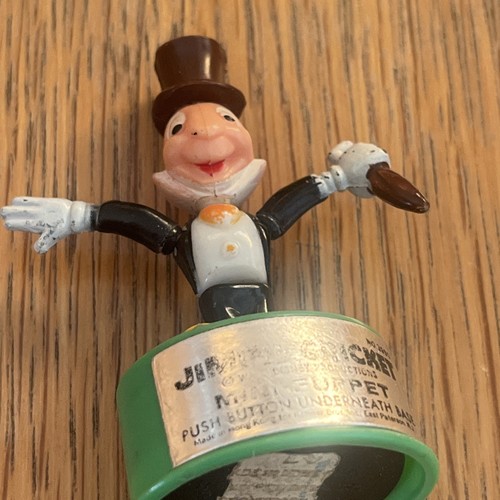 Jiminy cricket push - jiminy,