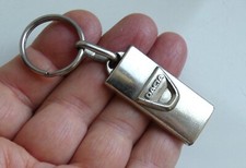 Porte clé DACIA métal Garage Automobile Logo Calandre Soreca Deffeuille.