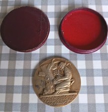 Ancienne médaille en bronze