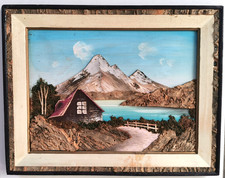 Tableau chalet au bord d'un lac dans la montagne vintage en relief