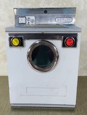 Jouet en tôle machine à