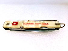 Couteau de poche multifonction Pradel publicitaire " Champagne Henri Abelé "