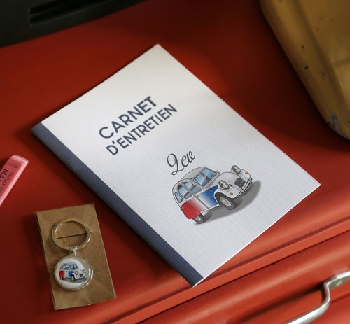 Porte clés carnet - +,
