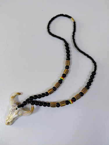 Collier pendentif tête - , de