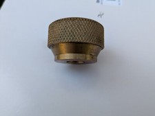 Un écrou moleté laiton M 12 neuf