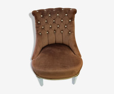 Fauteuil crapaud capitonné