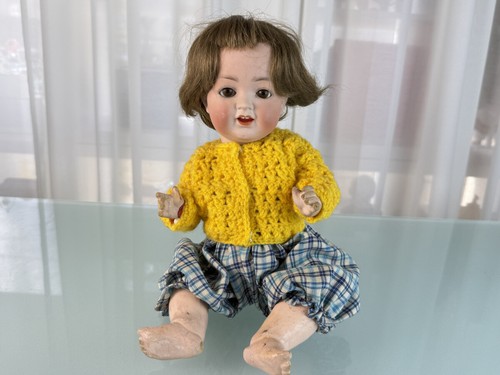 Poupée tête porcelaine