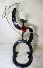 cowboy horse shoe figurine -
