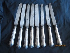 8 couteaux lame acier, manches